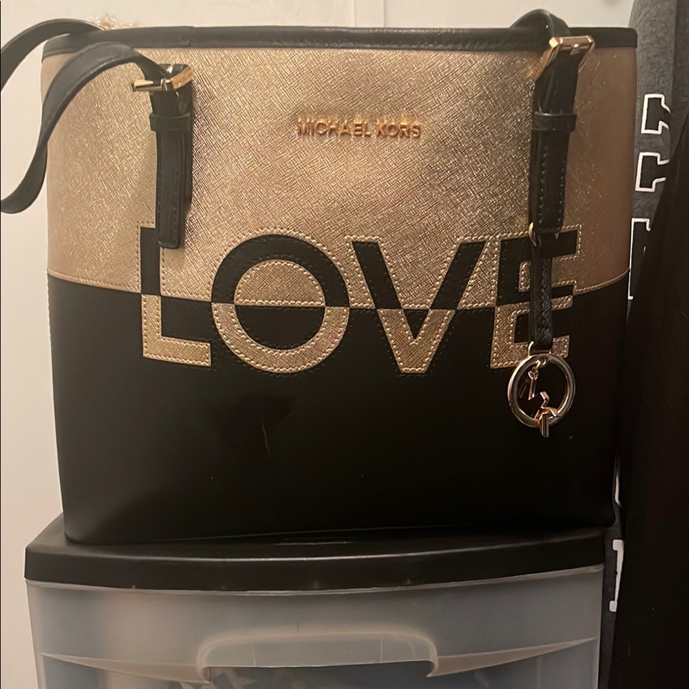 Michael Kors Black and Gold Tote with Sleek Design